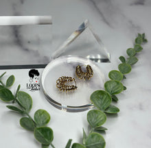 Load image into Gallery viewer, Discover the elegance and innovation of these stainless steel small hoops, featuring intricate winding designs. Elevate your style with these standout fashion pieces that blend uniqueness with sophistication. Shop now to embrace a touch of artistic finesse in your attire.