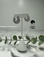 Load image into Gallery viewer, Discover the elegance and innovation of these stainless steel small hoops, featuring intricate winding designs. Elevate your style with these standout fashion pieces that blend uniqueness with sophistication. Shop now to embrace a touch of artistic finesse in your attire.