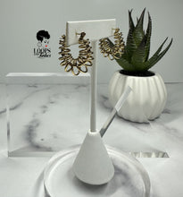 Load image into Gallery viewer, Discover the elegance and innovation of these stainless steel small hoops, featuring intricate winding designs. Elevate your style with these standout fashion pieces that blend uniqueness with sophistication. Shop now to embrace a touch of artistic finesse in your attire.