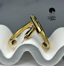 Load image into Gallery viewer, Heritage Hoops displayed against a clean background, showcasing their two-inch open hoop design with a unique textured finish. Made from stainless steel with durable PVD gold plating, these waterproof, tarnish-resistant earrings feature an exclusive engraved submark logo, blending timeless elegance with modern craftsmanship.