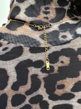 Load image into Gallery viewer, A stunning stainless steel PVD gold plated necklace with a pendant representing body positivity. The pendant showcases a women's body in a frame, symbolizing self-love and acceptance. Crafted with high-quality materials, this necklace promotes body positivity and empowers women to embrace their bodies