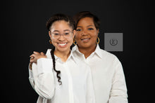 Load image into Gallery viewer, Women elegantly wearing the Dynasty Hoops and Heritage, gold-plated stainless steel earrings with a sleek, minimalist hollow design. These timeless hoops shine with a luxurious finish, symbolizing strength, sophistication, and legacy. Light yet bold, they add effortless elegance to her look, making every detail count.