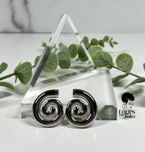 Load image into Gallery viewer, Swirl Studs: Elegant stainless steel earrings with a modern swirl design. Elevate your style effortlessly. Perfect for any occasion