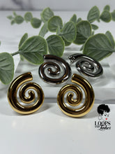 Load image into Gallery viewer, Swirl Studs: Elegant stainless steel earrings with a modern swirl design. Elevate your style effortlessly. Perfect for any occasion