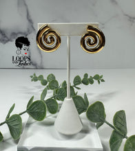 Load image into Gallery viewer, Swirl Studs: Elegant stainless steel earrings with a modern swirl design. Elevate your style effortlessly. Perfect for any occasion.