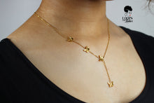 Load image into Gallery viewer, Gold-plated stainless-steel necklace with four butterfly pendants, symbolizing courage, growth, confidence, and freedom — body-positive statement jewelry.