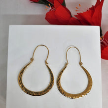 Load image into Gallery viewer, Vintage gold hoop earrings for women with a unique geometric round drop shape and hammered finish. The earrings are a beautiful statement accessory with a mix of classic and modern design elements.