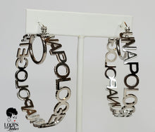 Load image into Gallery viewer, These silver custom earrings are truly for the unapologetically bold. These hoops earrings are stainless-steel and feature an openwork design with "UNAPOLOGETIC" lettering.
