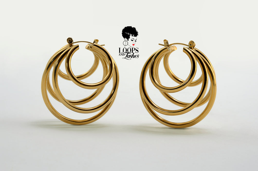 PVD gold-plated stainless steel QuintEssential Loops earrings. Modern, geometric design creates a five-hoop illusion. Stylish statement earrings for pierced ears. 1.61